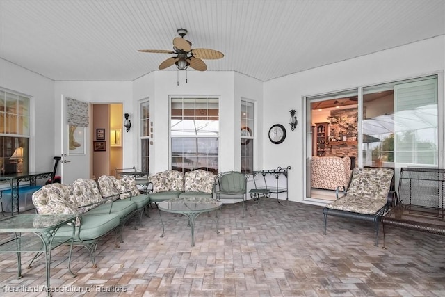 living room featuring ceiling fan