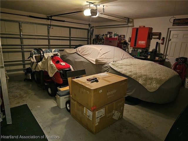 garage featuring a garage door opener