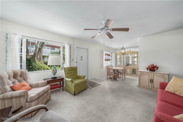 2113 Lakeview Dr Unit 1B, Sebring, FL 33870 - living room with healthy amount of natural light, ceiling fan, and light carpet