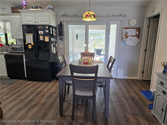 55 Lake Side Trl, Lake Placid, FL 33852 - dining area with dark wood-type flooring and baseboards