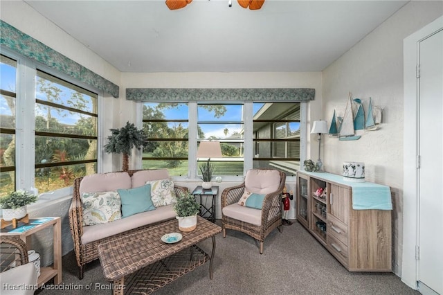 sunroom / solarium with ceiling fan