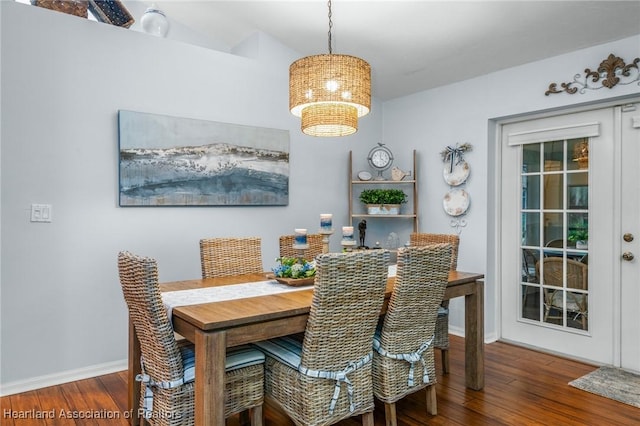 dining space featuring dark hardwood / wood-style floors