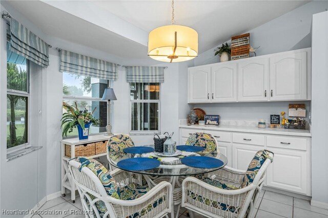 tiled dining room with breakfast area