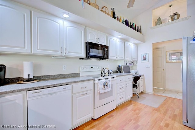 kitchen with white cabinetry, ceiling fan, white appliances, light wood-type flooring, and built in desk