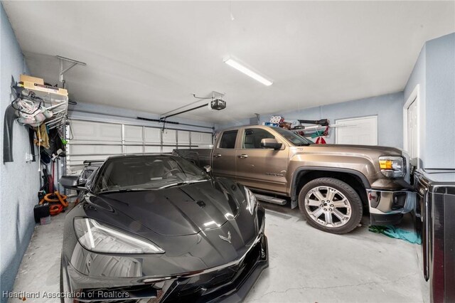 garage featuring a garage door opener