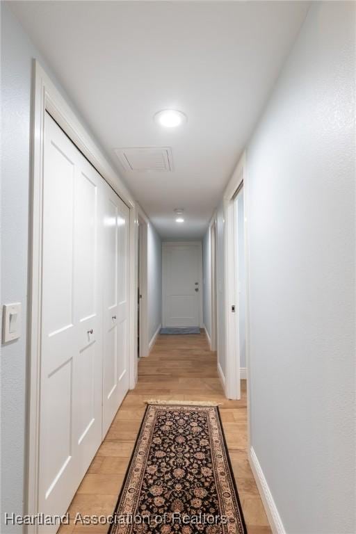 hall featuring light wood-type flooring