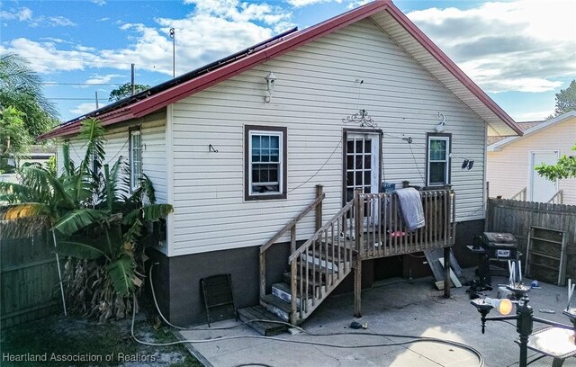 back of house with a patio area