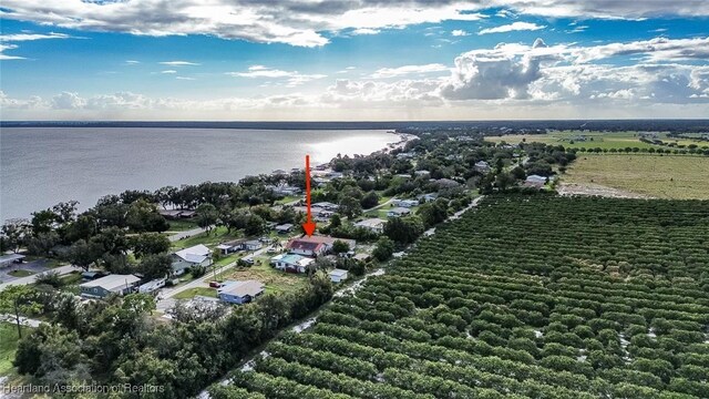 bird's eye view featuring a water view and a rural view