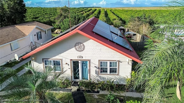 view of front of home with solar panels