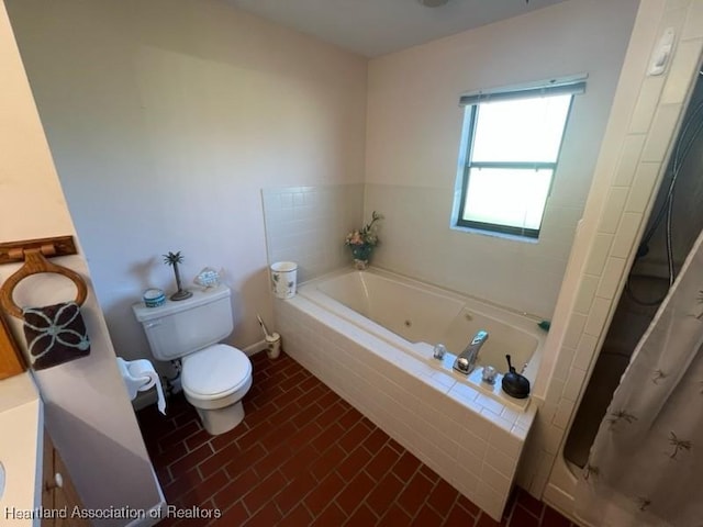 full bathroom featuring vanity, shower with separate bathtub, and toilet