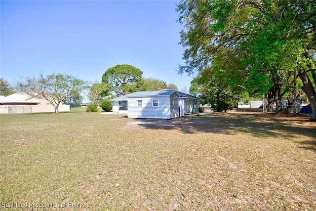 view of yard featuring fence