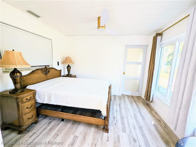 bedroom with light hardwood / wood-style flooring