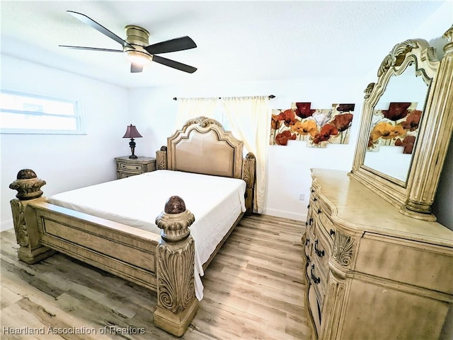 bedroom featuring ceiling fan and light wood-type flooring