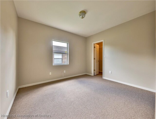 4021 Page Ave, Sebring, FL 33875 - unfurnished room featuring carpet floors and baseboards