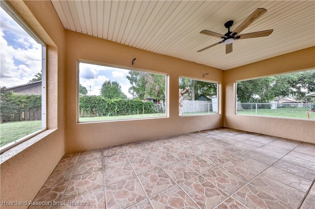 4021 Page Ave, Sebring, FL 33875 - unfurnished sunroom featuring a textured wall