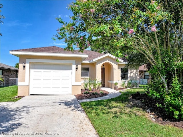 4021 Page Ave, Sebring, FL 33875 - ranch-style house with stucco siding, concrete driveway, an attached garage, and a shingled roof