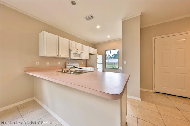4021 Page Ave, Sebring, FL 33875 - kitchen featuring white appliances, light countertops, a peninsula, light tile patterned floors, and ornamental molding