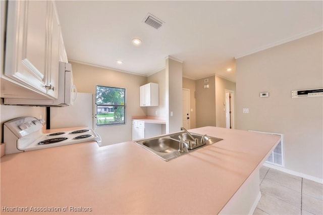 4021 Page Ave, Sebring, FL 33875 - kitchen featuring white appliances, white cabinetry, light countertops, ornamental molding, and light tile patterned flooring