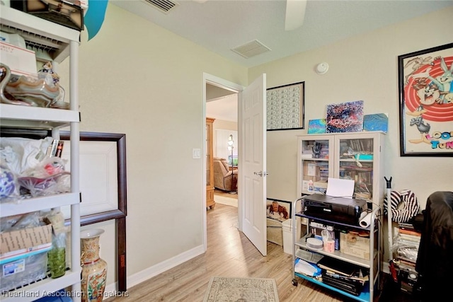 office space featuring light hardwood / wood-style floors