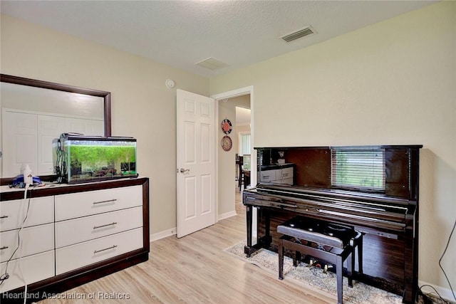 miscellaneous room featuring light hardwood / wood-style flooring