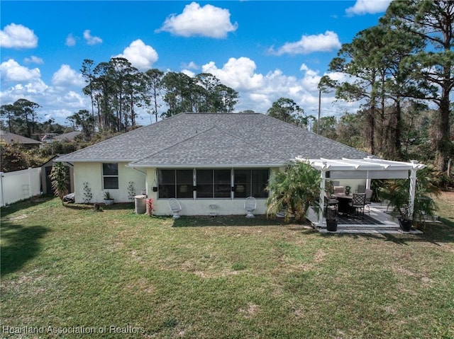 rear view of property with a shingled roof, a lawn, fence private yard, and a pergola