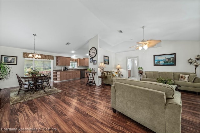 living room featuring lofted ceiling, dark wood-style flooring, ceiling fan with notable chandelier, and visible vents