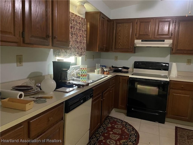 16 Notre Dame St, Lake Placid, FL 33852 - kitchen with electric range, dishwasher, light countertops, a sink, and under cabinet range hood