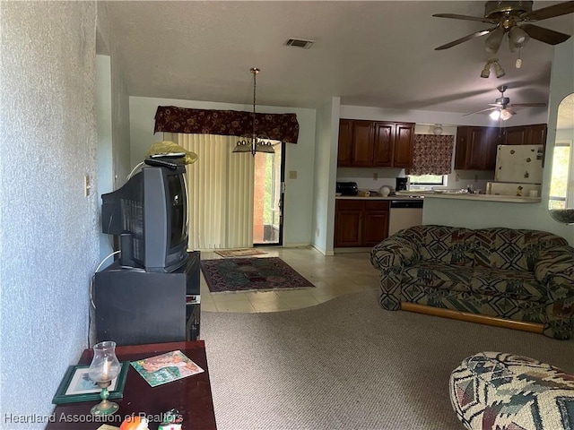 16 Notre Dame St, Lake Placid, FL 33852 - living room featuring visible vents, a ceiling fan, and light tile patterned flooring