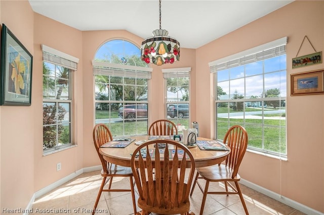 sunroom / solarium featuring lofted ceiling