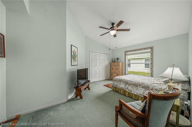 bedroom featuring carpet, high vaulted ceiling, a closet, and ceiling fan