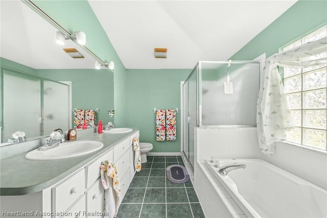 full bathroom featuring tile patterned floors, vanity, separate shower and tub, and toilet