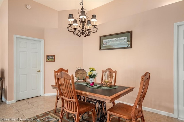 tiled dining area with a notable chandelier