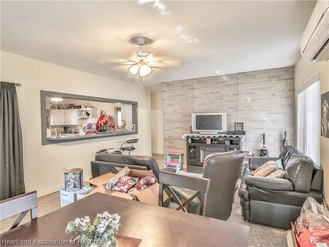 living room featuring a wall mounted air conditioner and ceiling fan