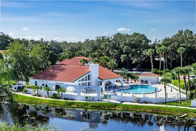 birds eye view of property featuring a water view