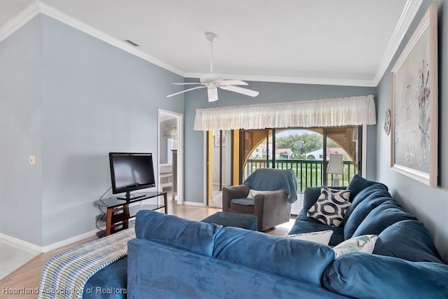 living room with lofted ceiling, ceiling fan, and crown molding