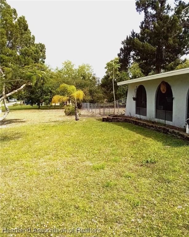 view of yard featuring fence