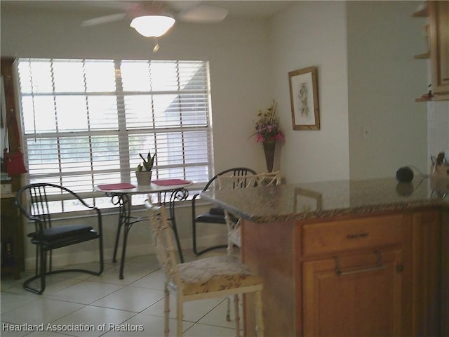 dining room featuring light tile patterned floors