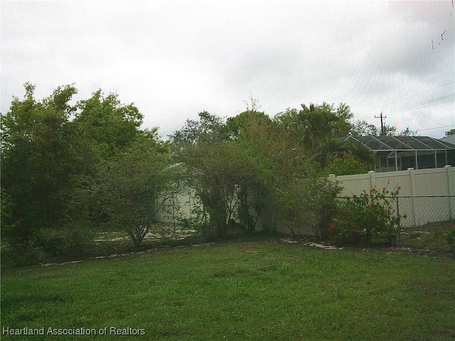 view of yard with fence