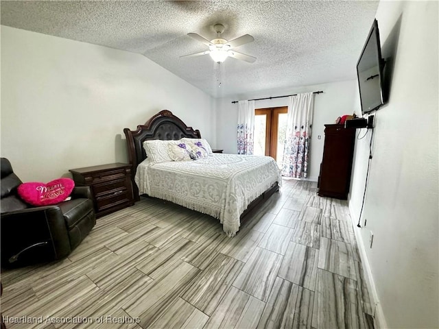 bedroom with ceiling fan and vaulted ceiling