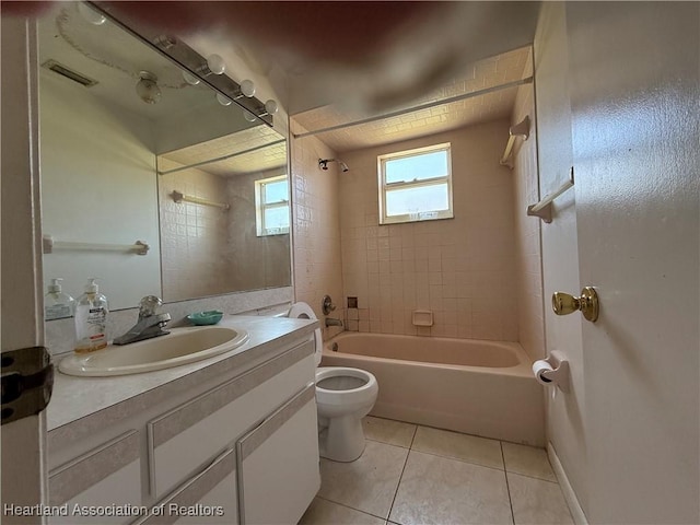 full bath featuring tile patterned floors, vanity,  shower combination, toilet, and visible vents