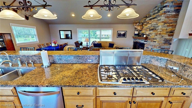 1244 Kelly Ct, Wauchula, FL 33873 - kitchen with appliances with stainless steel finishes, vaulted ceiling, hanging light fixtures, open floor plan, and recessed lighting