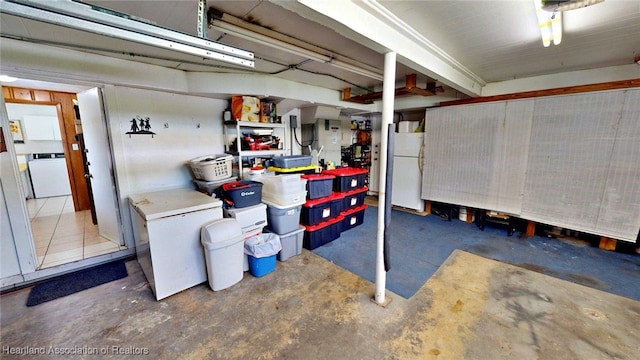 1244 Kelly Ct, Wauchula, FL 33873 - basement with freestanding refrigerator and white fridge