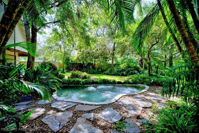 1237 Hotiyee Ave, Sebring, FL 33870 - view of yard featuring a garden pond