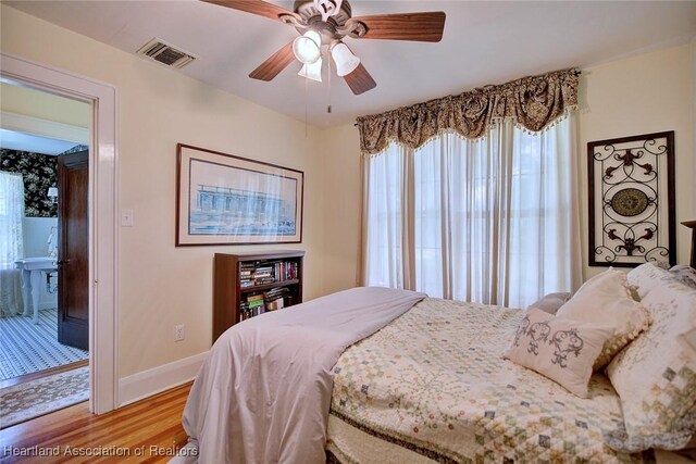 1237 Hotiyee Ave, Sebring, FL 33870 - bedroom with light wood-style flooring and a ceiling fan
