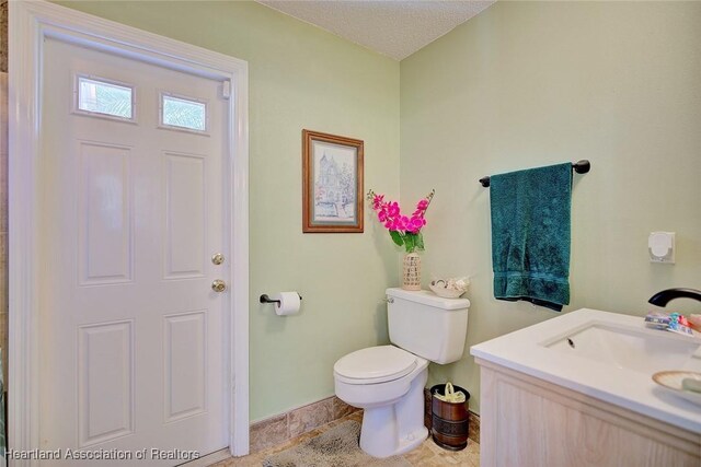 1237 Hotiyee Ave, Sebring, FL 33870 - bathroom with toilet and vanity