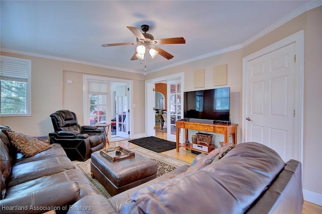 1237 Hotiyee Ave, Sebring, FL 33870 - living area with ornamental molding, a ceiling fan, and wood finished floors