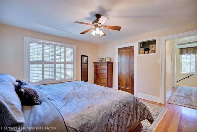 1237 Hotiyee Ave, Sebring, FL 33870 - bedroom featuring wood finished floors and a ceiling fan