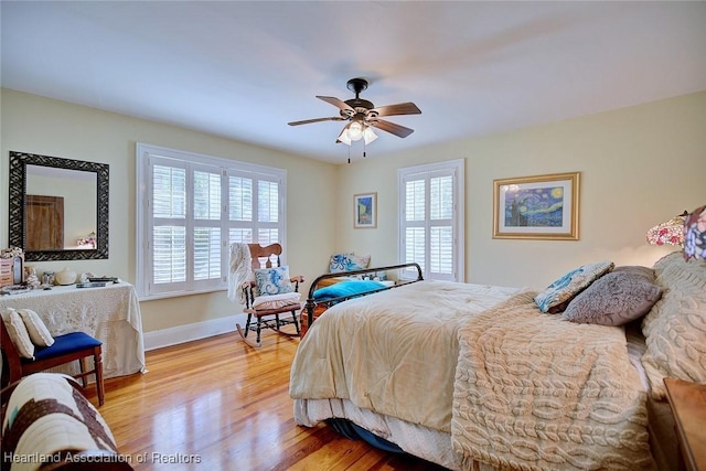 1237 Hotiyee Ave, Sebring, FL 33870 - bedroom with wood finished floors and a ceiling fan