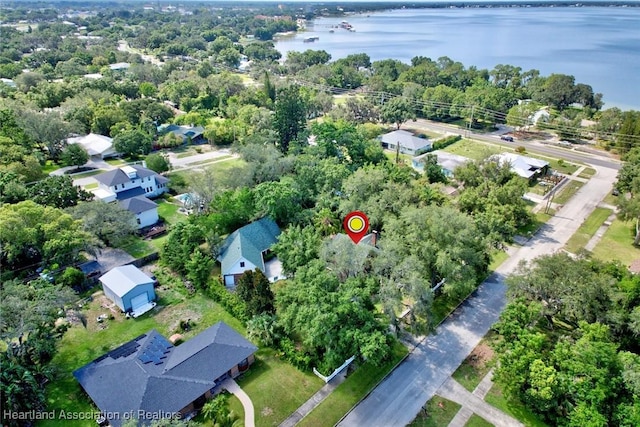 1237 Hotiyee Ave, Sebring, FL 33870 - aerial overview of property's location with a nearby body of water and a tree filled landscape