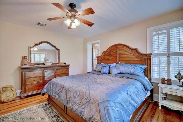 1237 Hotiyee Ave, Sebring, FL 33870 - bedroom featuring wood finished floors and ceiling fan